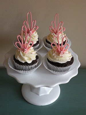 Learn how to make these chocolate design cupcake toppers HERE at Icing 