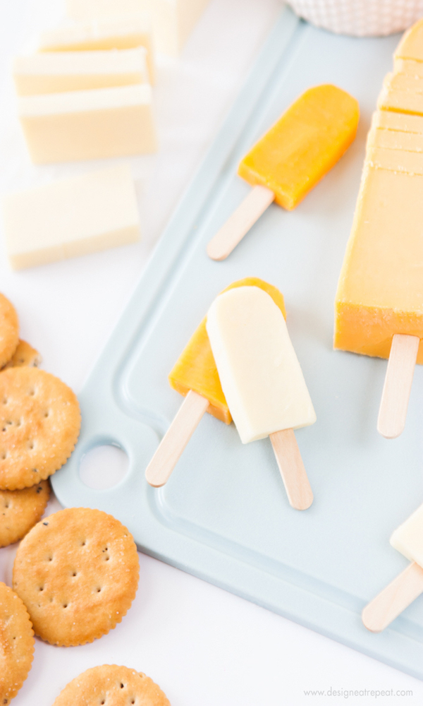 Turn-cheese-slices-into-mini-popsicles-with-this-fun-cheese-board-idea