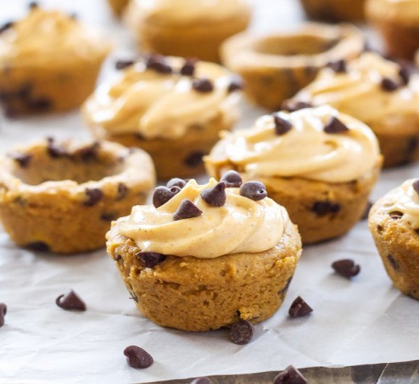 pumpkin chocolate chip cookie cups with pumpkin cream cheese frosting