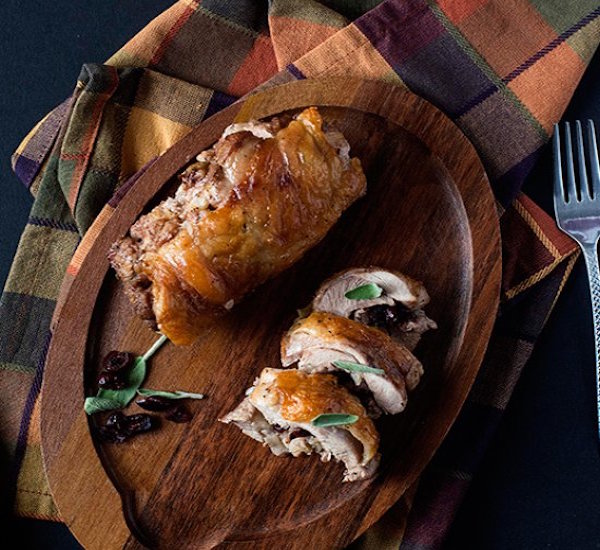 roasted turkey thighs stuffed with dried cranberries, mushroom and sausage