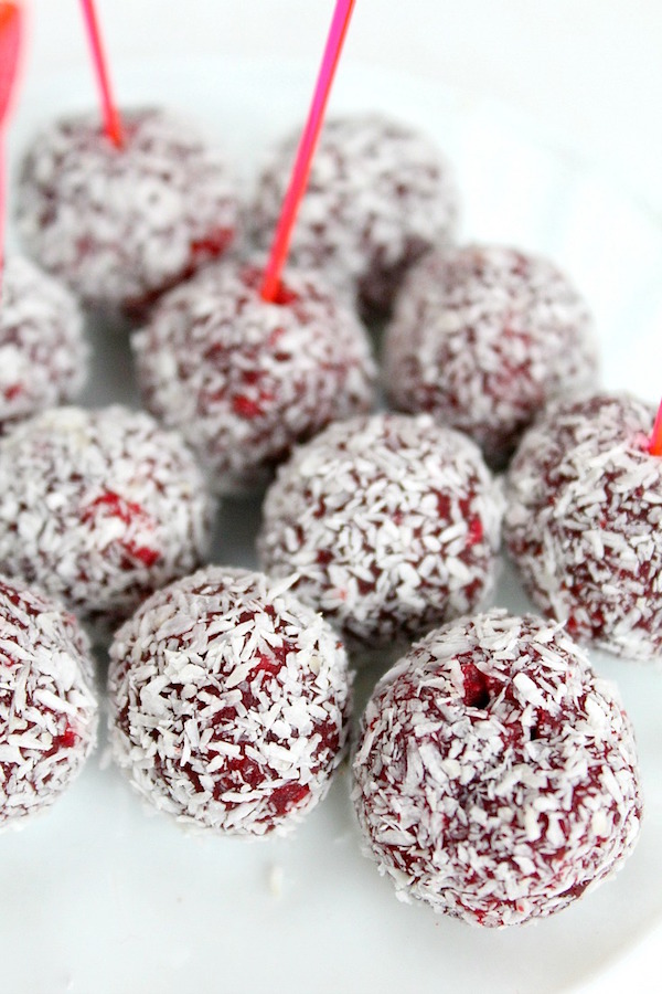 red velvet cake balls with coconut and white chocolate bits